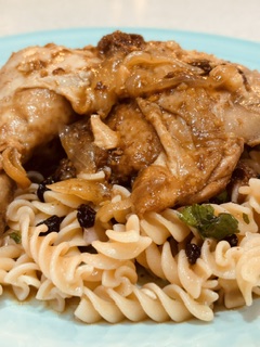 Cinnamon chicken with caramelised onions served over spiral pasta