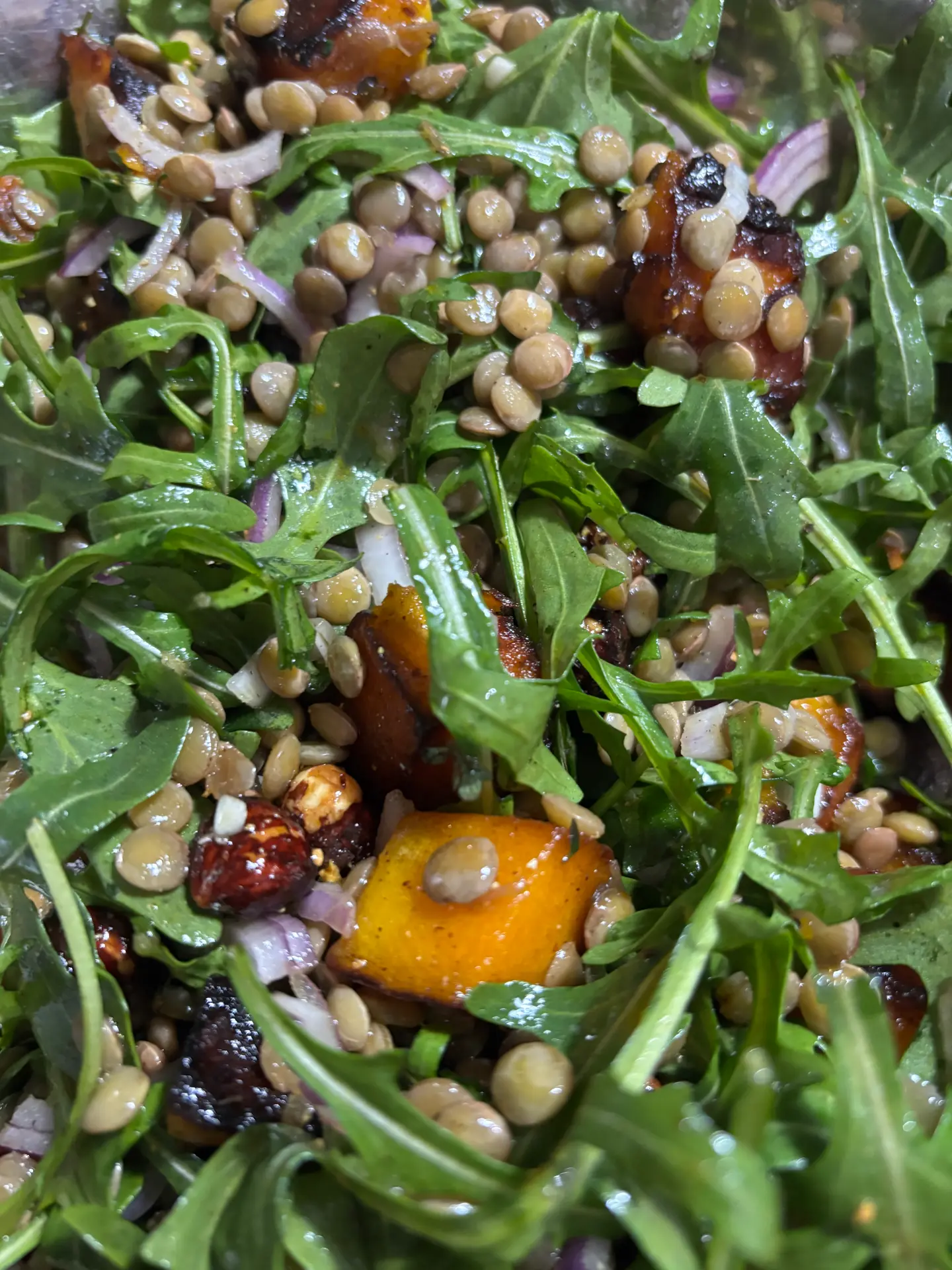 Honey cinnamon pumpkin lentil salad with rocket, red onion and glazed nuts