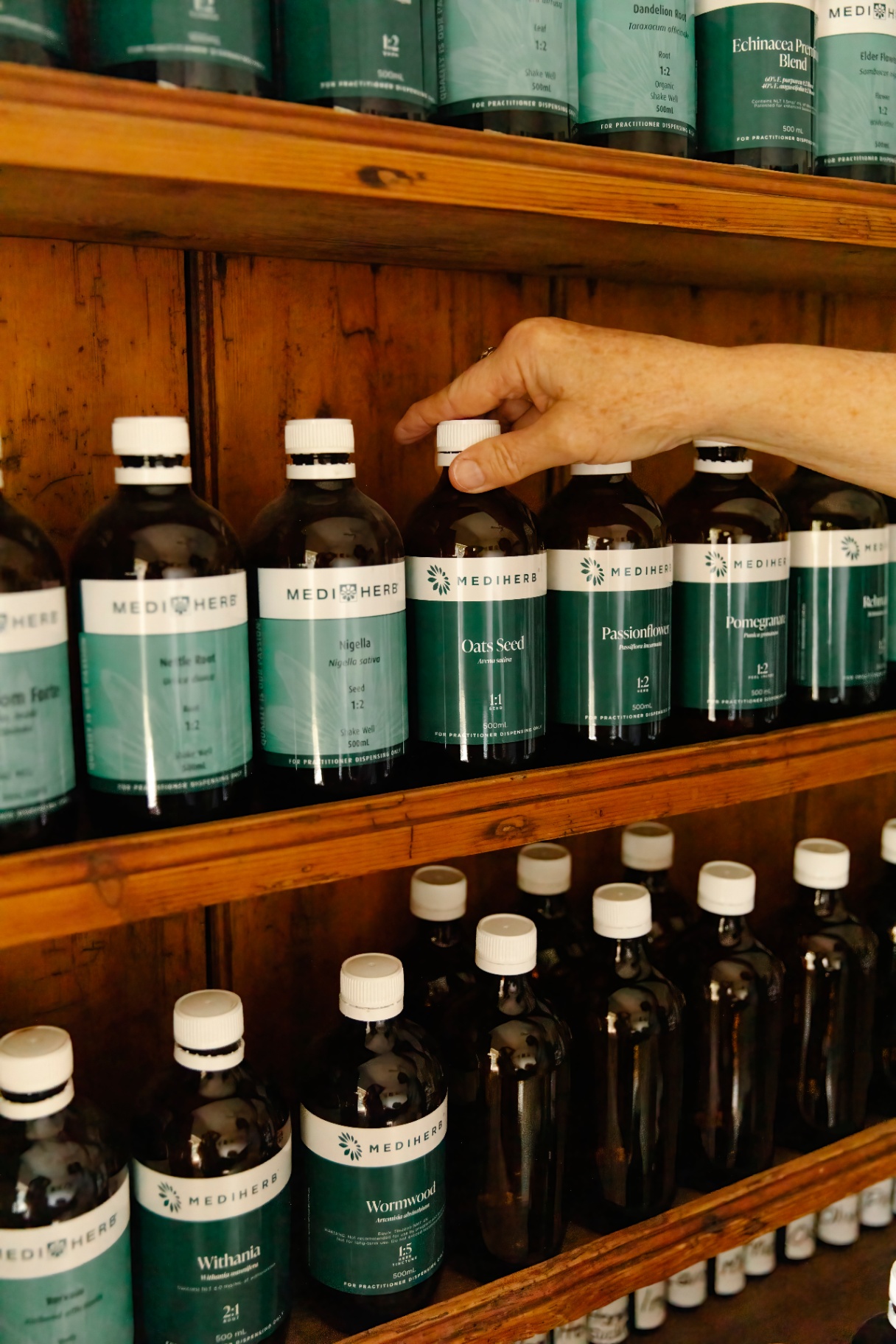 Close-up of Sharon's herbal dispensary bottles